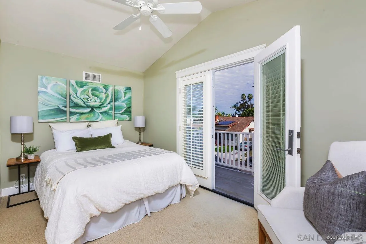 4112 Jackdaw Street San Diego, CA 92103 - Photo 22 of 34 a bedroom with a bed and a painting on the wall