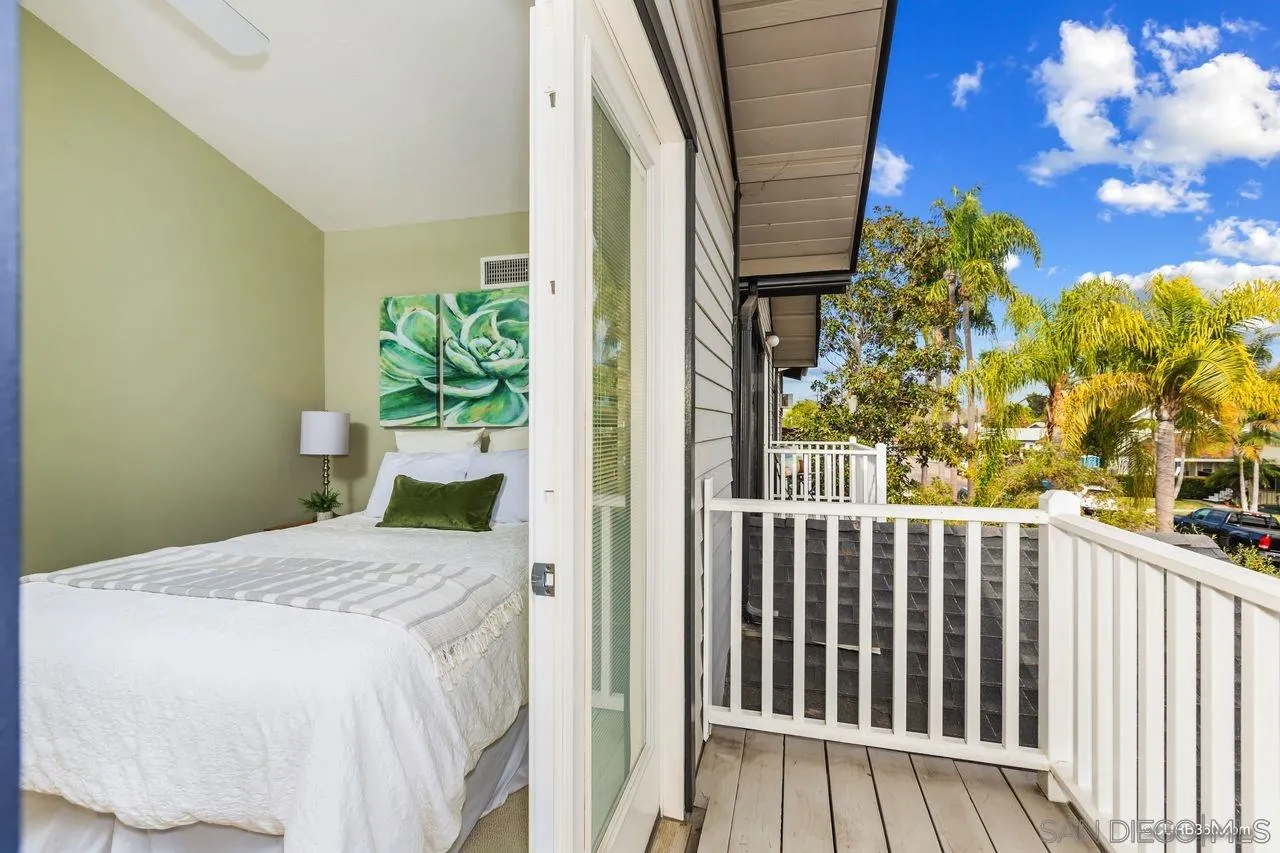 4112 Jackdaw Street San Diego, CA 92103 - Photo 23 of 34 a bedroom with a bed and a window