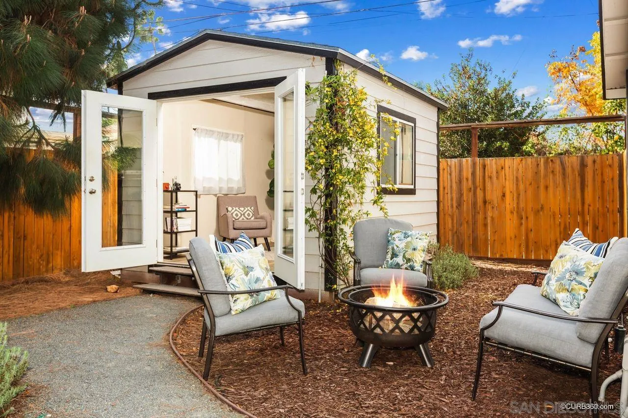 4112 Jackdaw Street San Diego, CA 92103 - Photo 28 of 34 a balcony with furniture and a potted plant