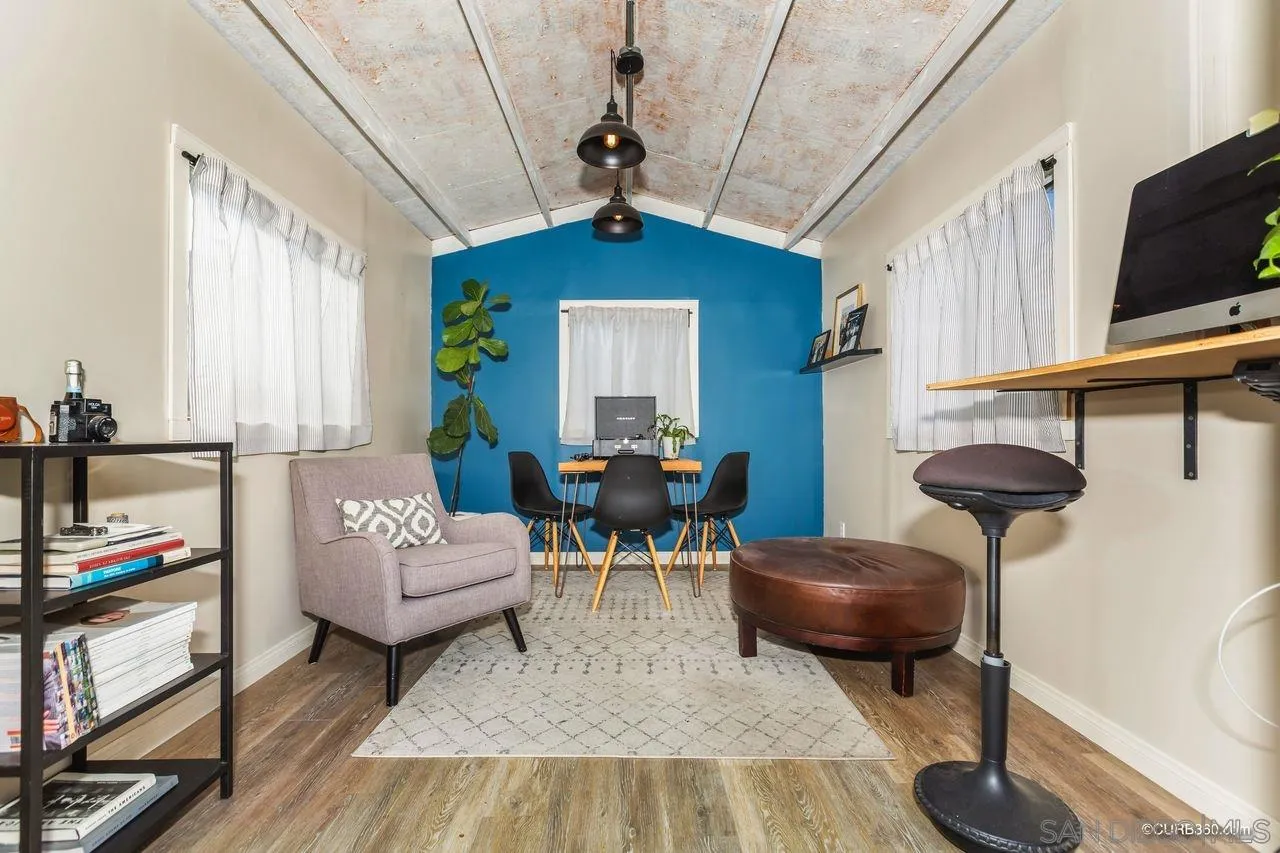 4112 Jackdaw Street San Diego, CA 92103 - Photo 29 of 34 a living room with furniture and a flat screen tv