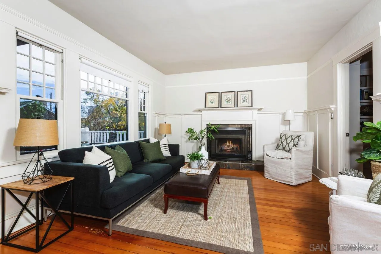 4112 Jackdaw Street San Diego, CA 92103 - Photo 3 of 34 a living room with furniture and a fireplace