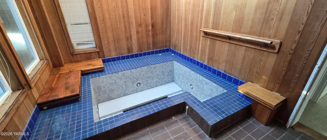 a sitting area with window