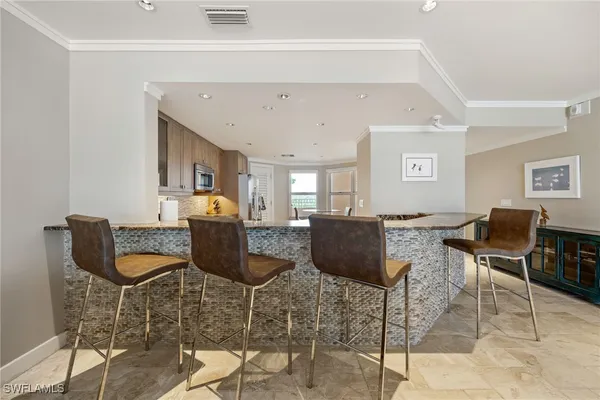 a view of a dining room with furniture