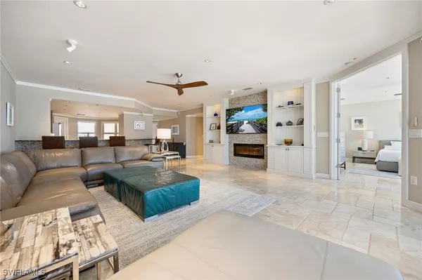 a living room with furniture and a view of living room