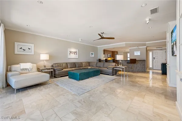 a living room with furniture and a view of living room