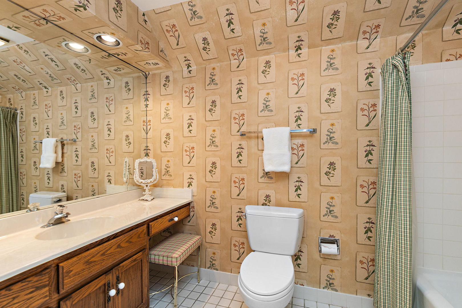 43 North Ravenscraig Lane Inverness, IL 60067 - Photo 26 of 67 a bathroom with a sink a toilet and shower curtain