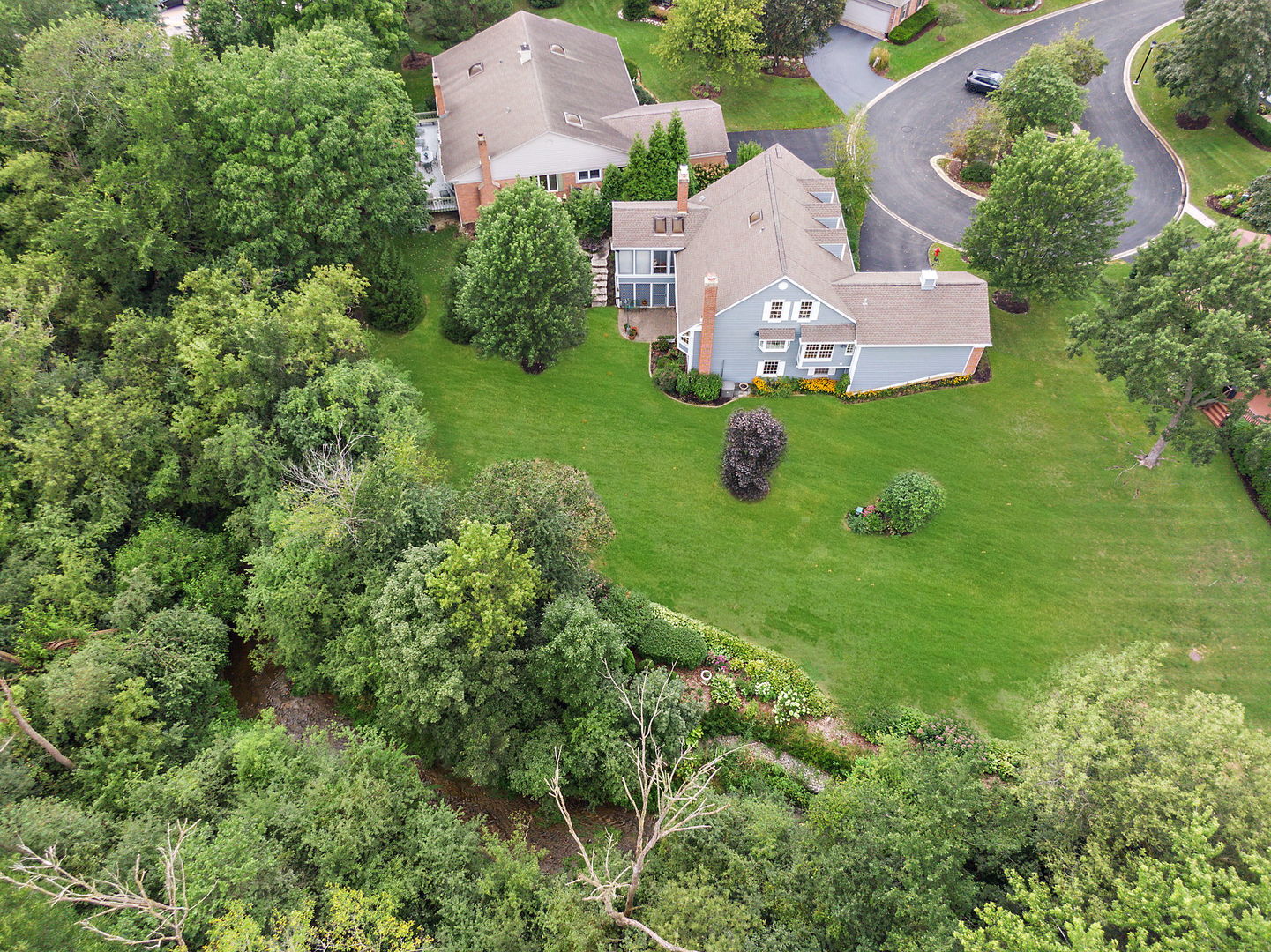 43 North Ravenscraig Lane Inverness, IL 60067 - Photo 51 of 67 an aerial view of a house with a garden and trees