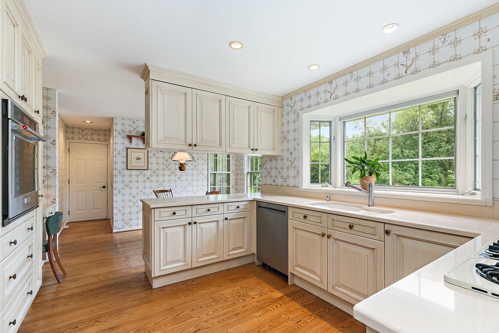 43 North Ravenscraig Lane Inverness, IL 60067 - Photo 6 of 67 a kitchen with a sink stove and cabinets