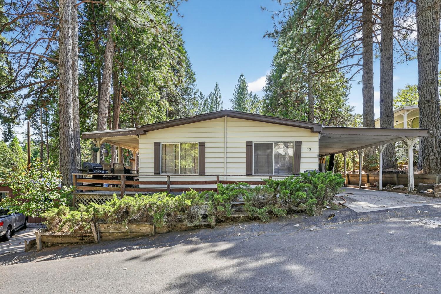 front view of a house with a garden