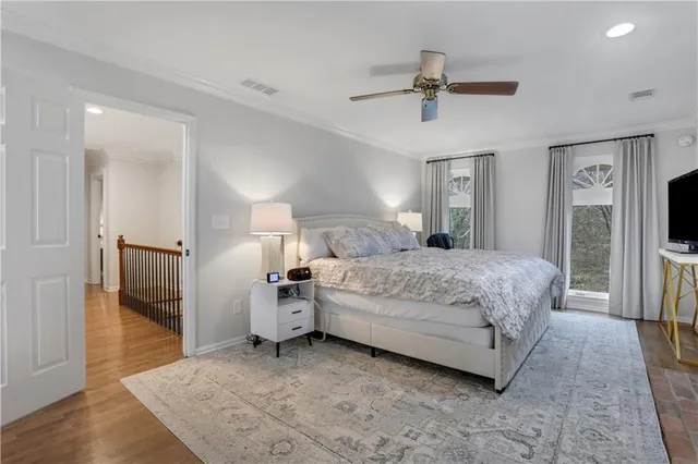 a bedroom with a bed and a walk in closet