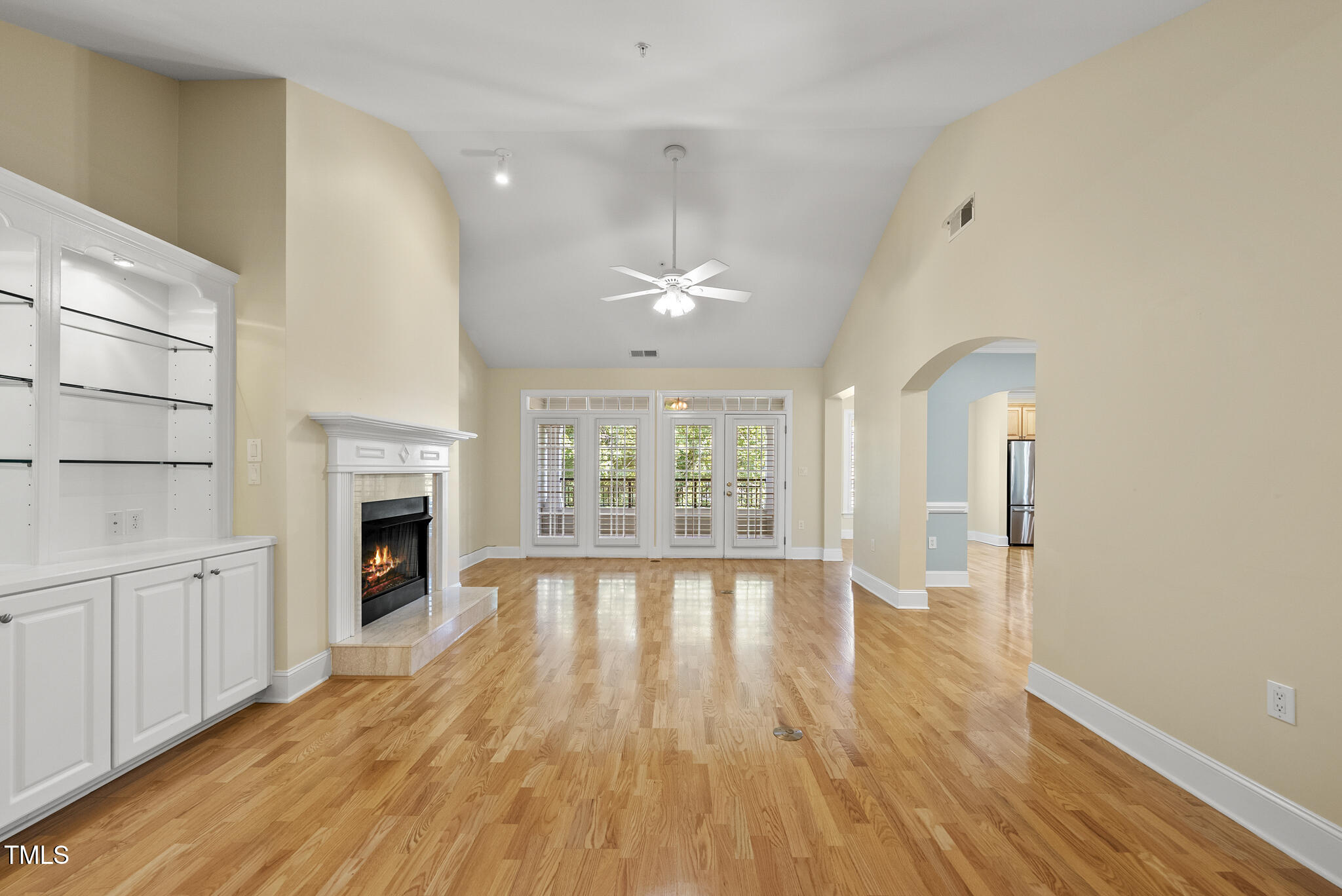 3700 Baron Cooper Pass, Unit 302 Raleigh, NC 27612 - Photo 15 of 67 a view of an empty room with wooden floor and a window