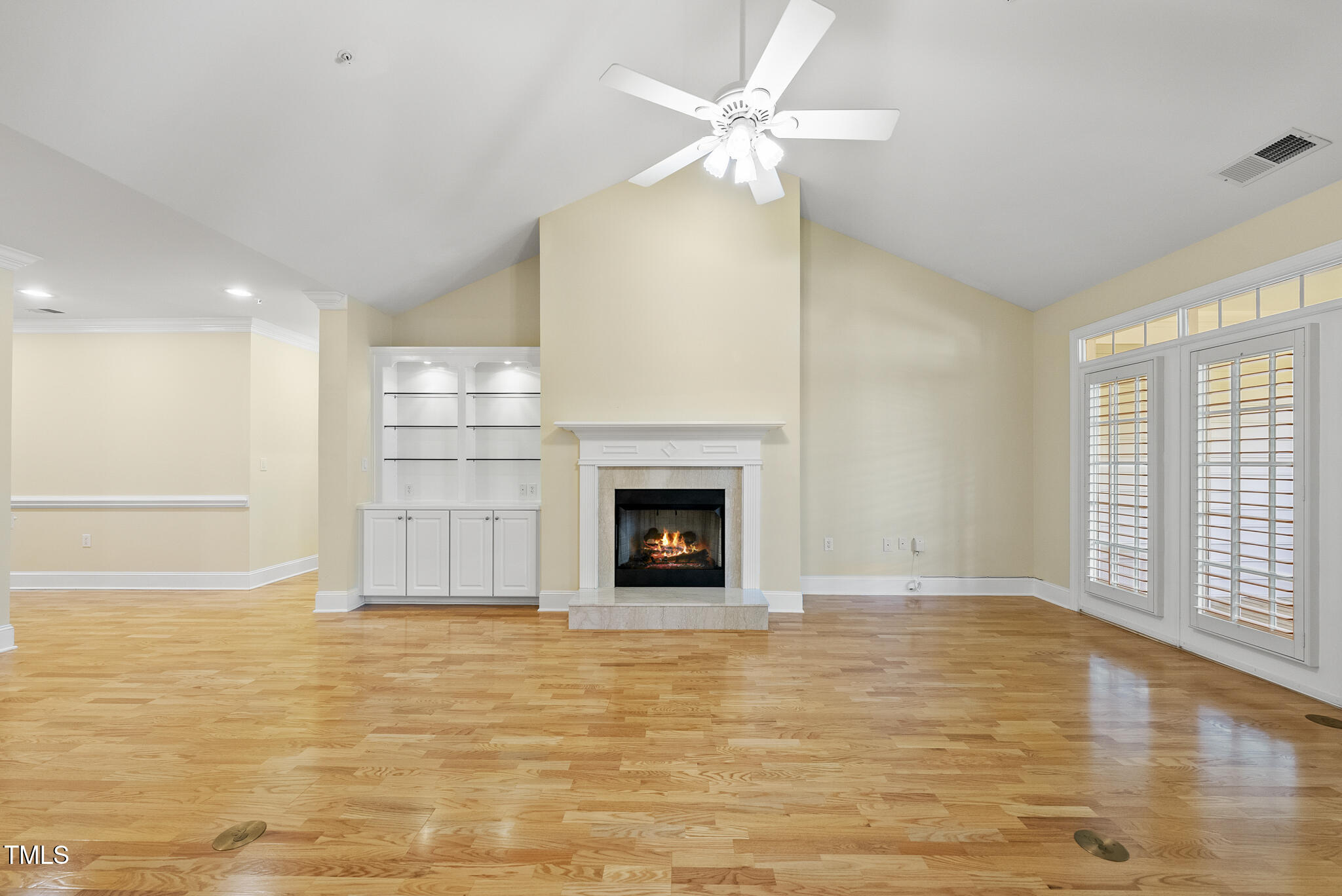 3700 Baron Cooper Pass, Unit 302 Raleigh, NC 27612 - Photo 17 of 67 a view of a livingroom with a fireplace
