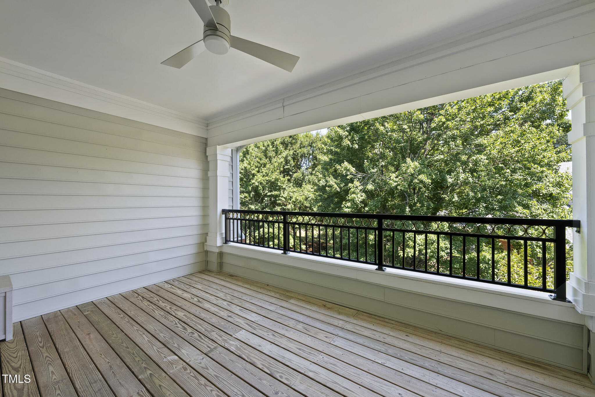3700 Baron Cooper Pass, Unit 302 Raleigh, NC 27612 - Photo 18 of 67 a view of a balcony with wooden floor