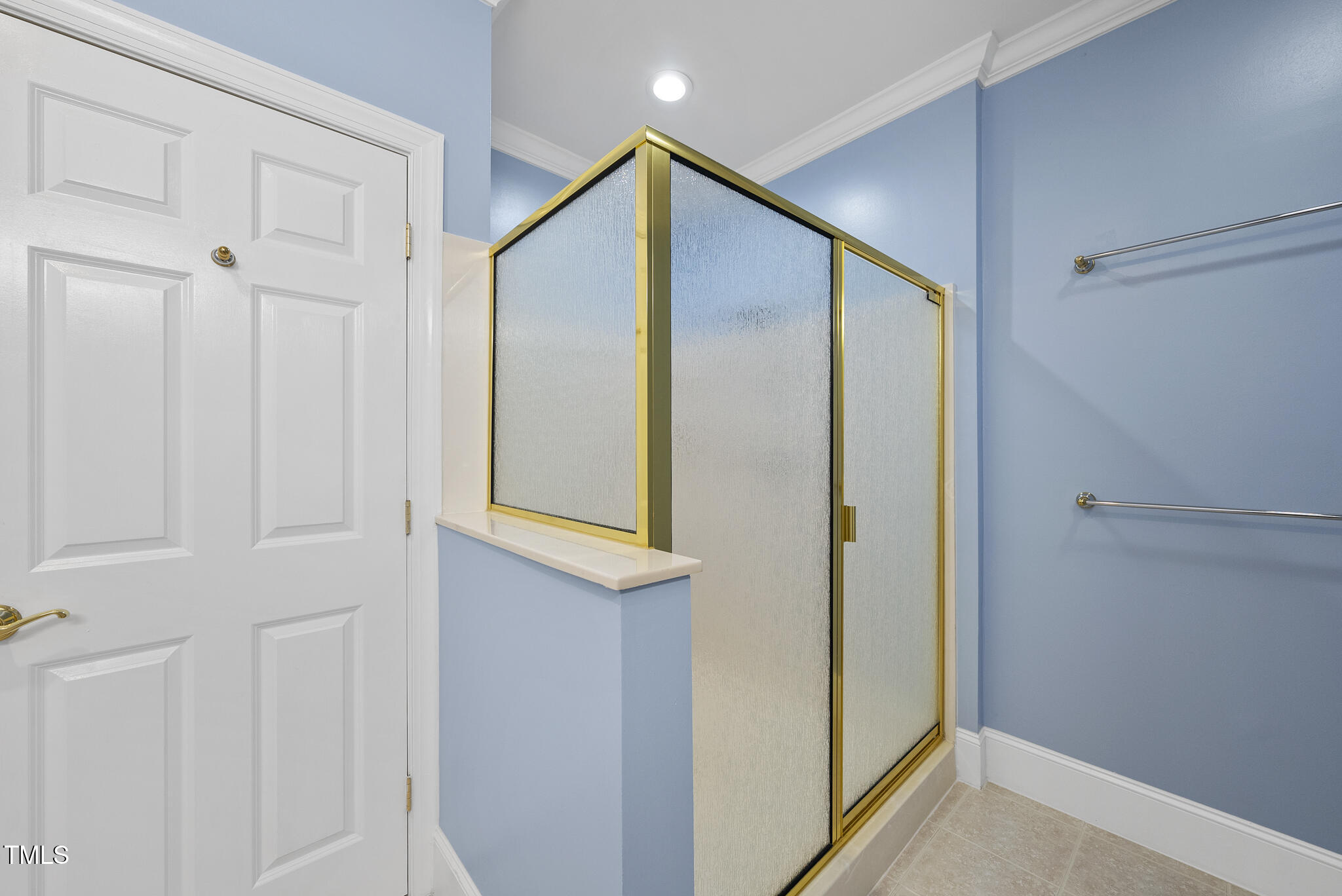 3700 Baron Cooper Pass, Unit 302 Raleigh, NC 27612 - Photo 40 of 67 a bathroom with a mirror
