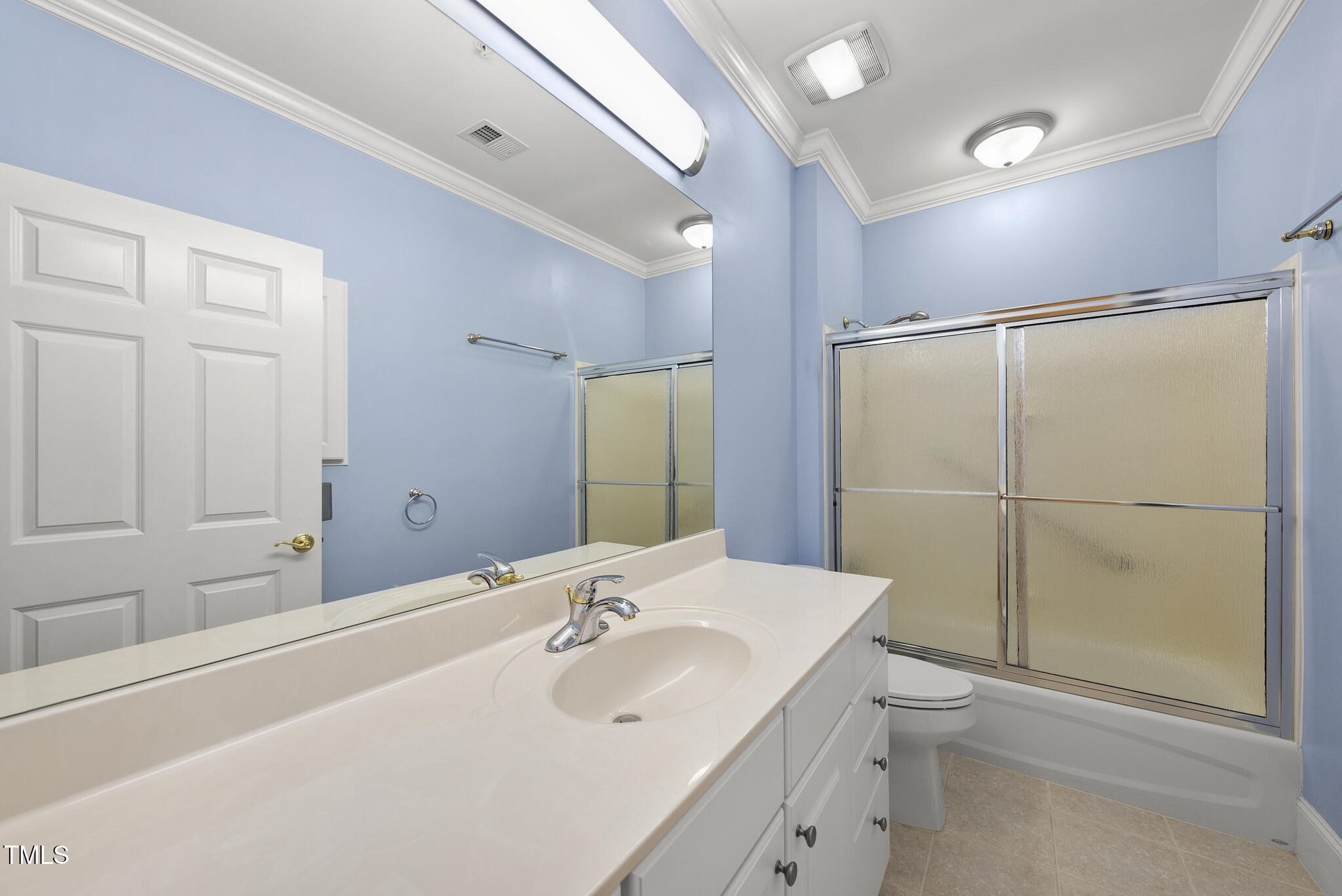 3700 Baron Cooper Pass, Unit 302 Raleigh, NC 27612 - Photo 46 of 67 a bathroom with a sink toilet and shower