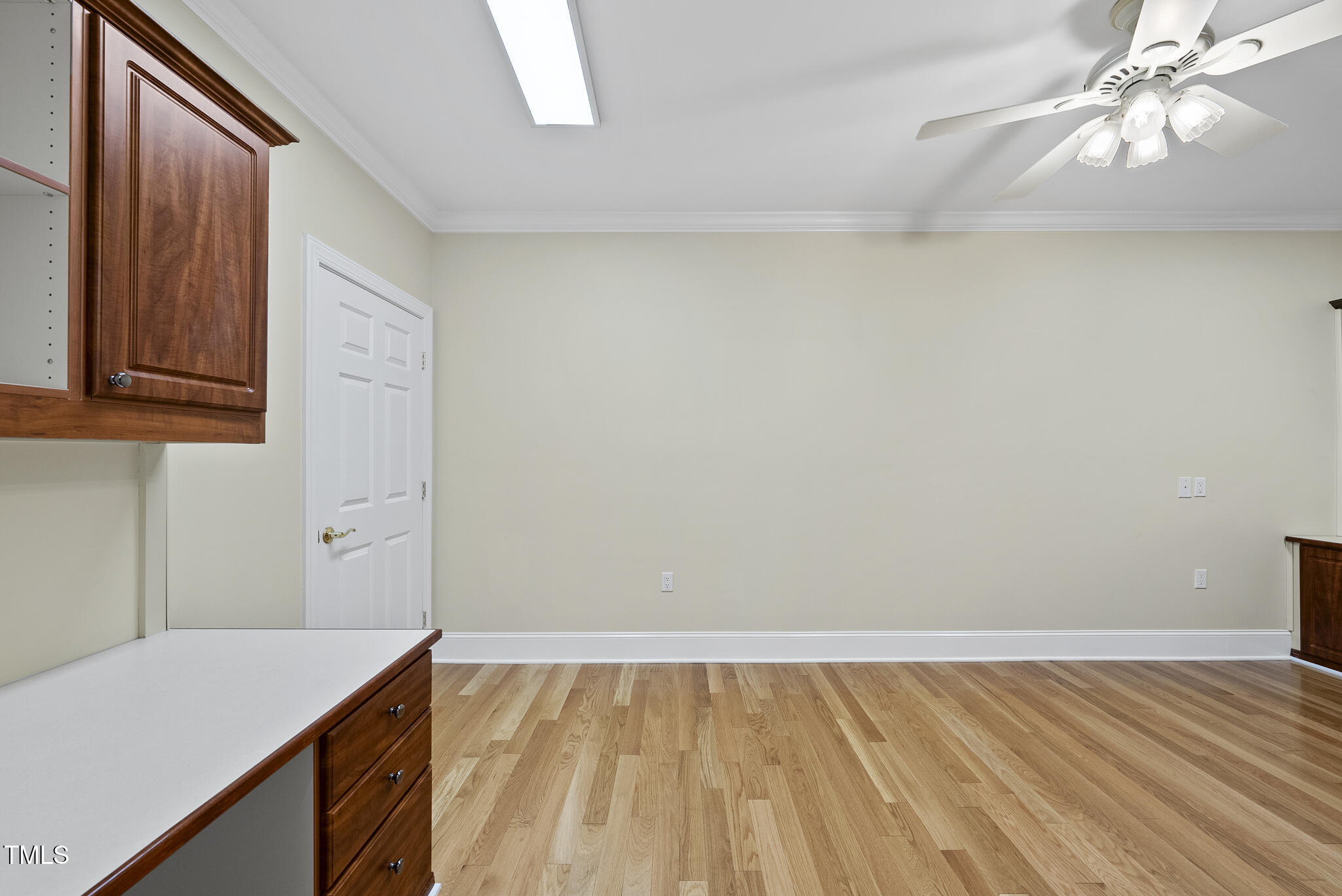 3700 Baron Cooper Pass, Unit 302 Raleigh, NC 27612 - Photo 50 of 67 a view of a room with wooden floor and staircase