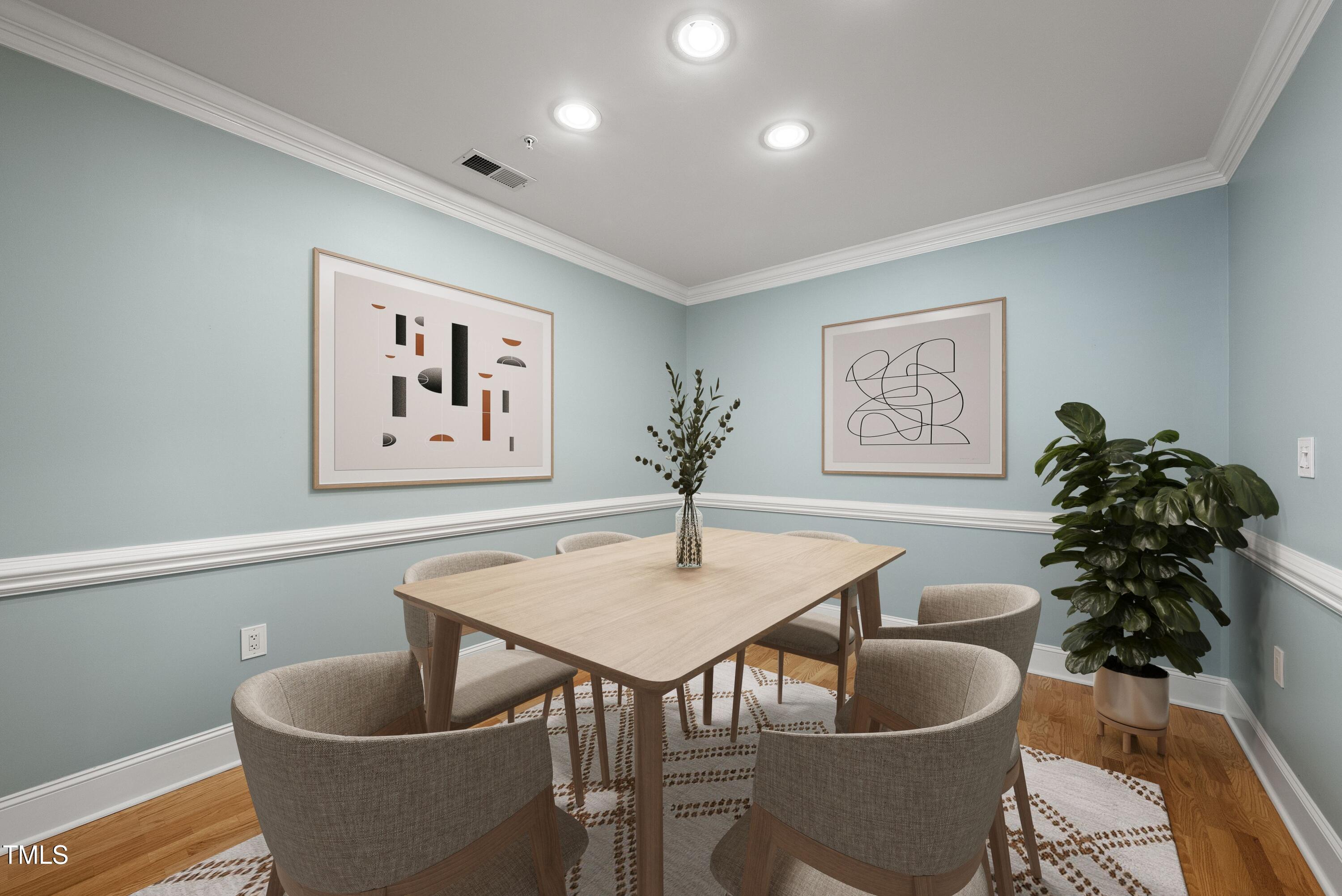 3700 Baron Cooper Pass, Unit 302 Raleigh, NC 27612 - Photo 6 of 67 a dining room with furniture and wooden floor