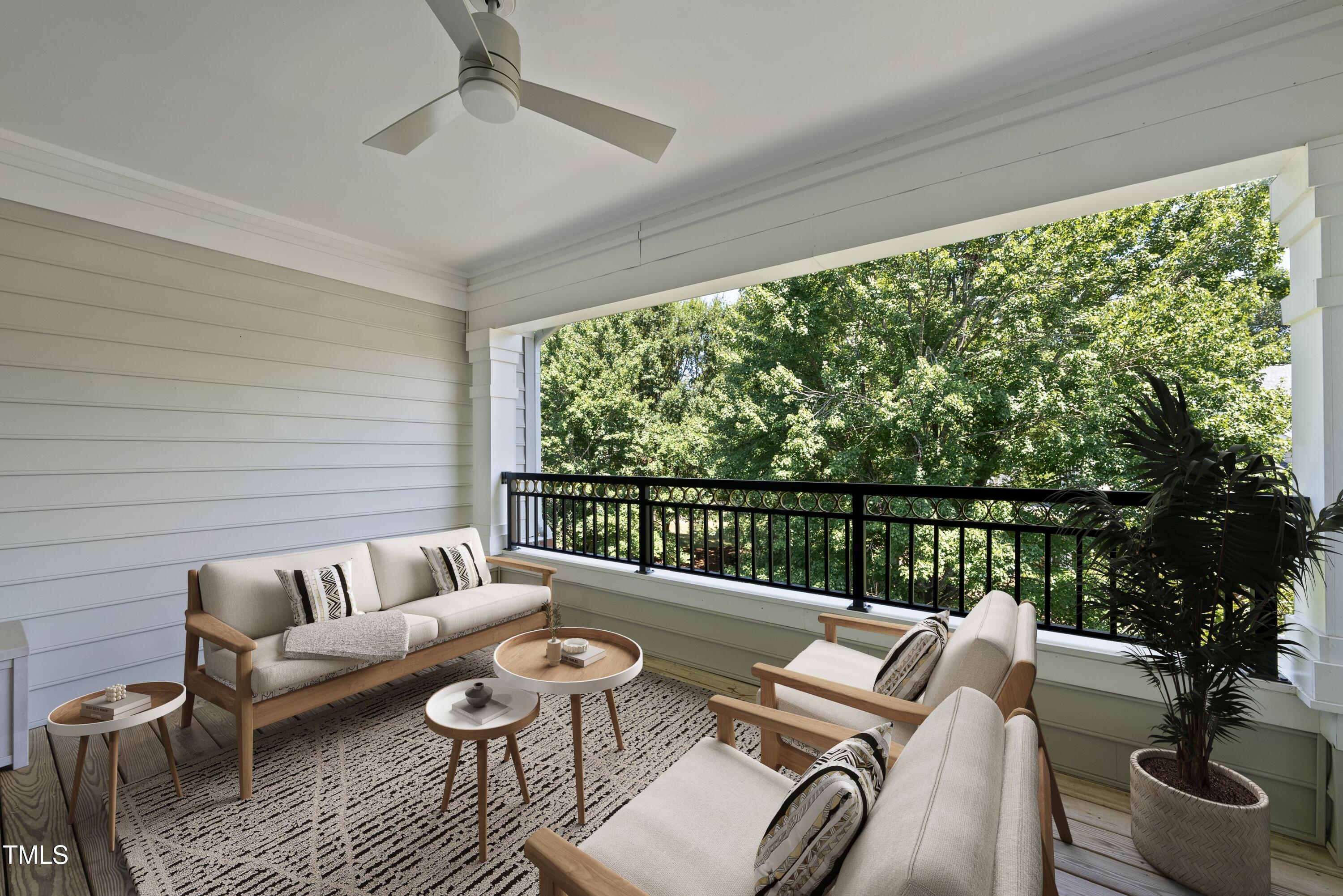 3700 Baron Cooper Pass, Unit 302 Raleigh, NC 27612 - Photo 7 of 67 a outdoor living room with furniture and a large window