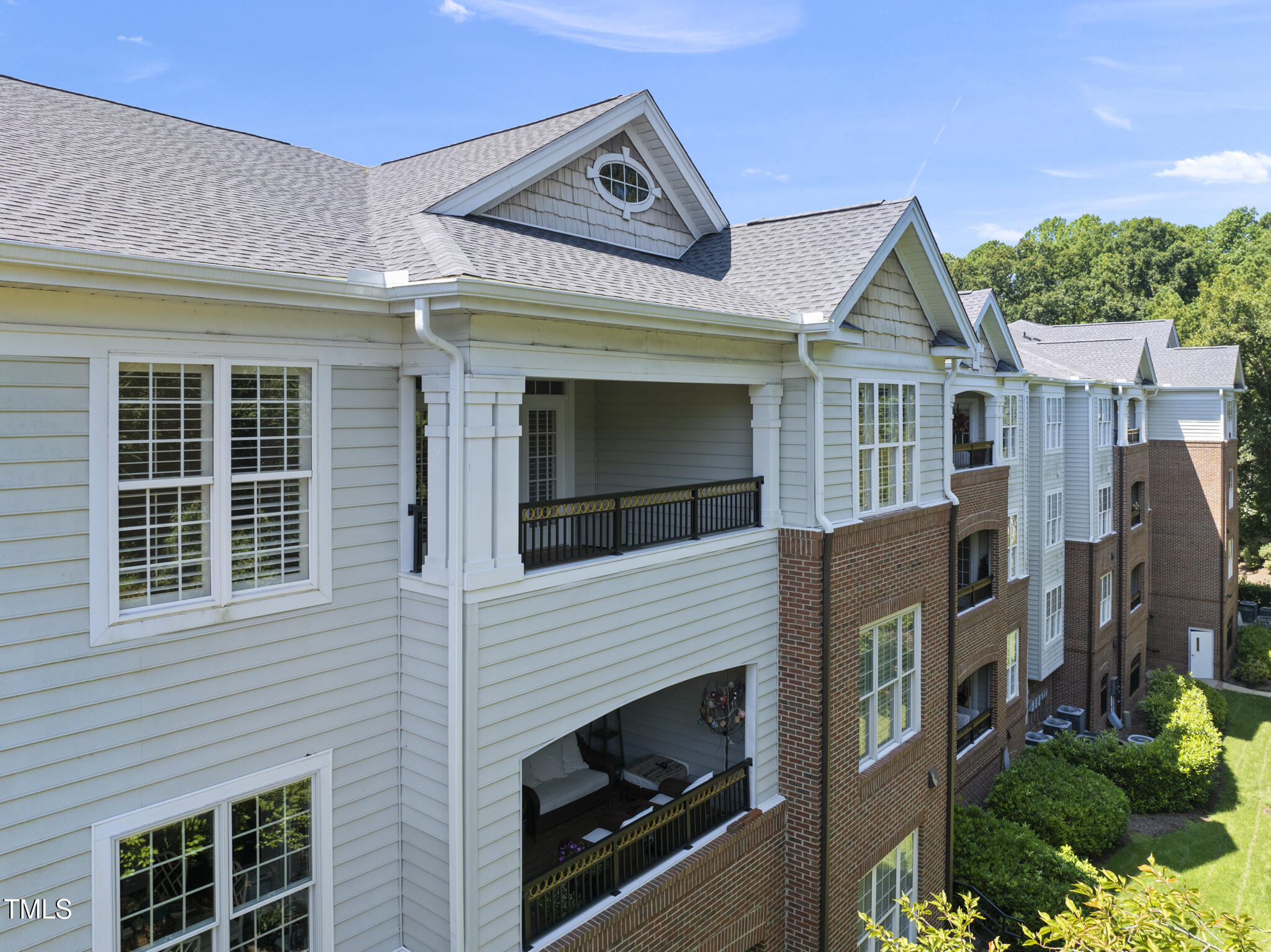 3700 Baron Cooper Pass, Unit 302 Raleigh, NC 27612 - Photo 8 of 67 front view of a house with a balcony