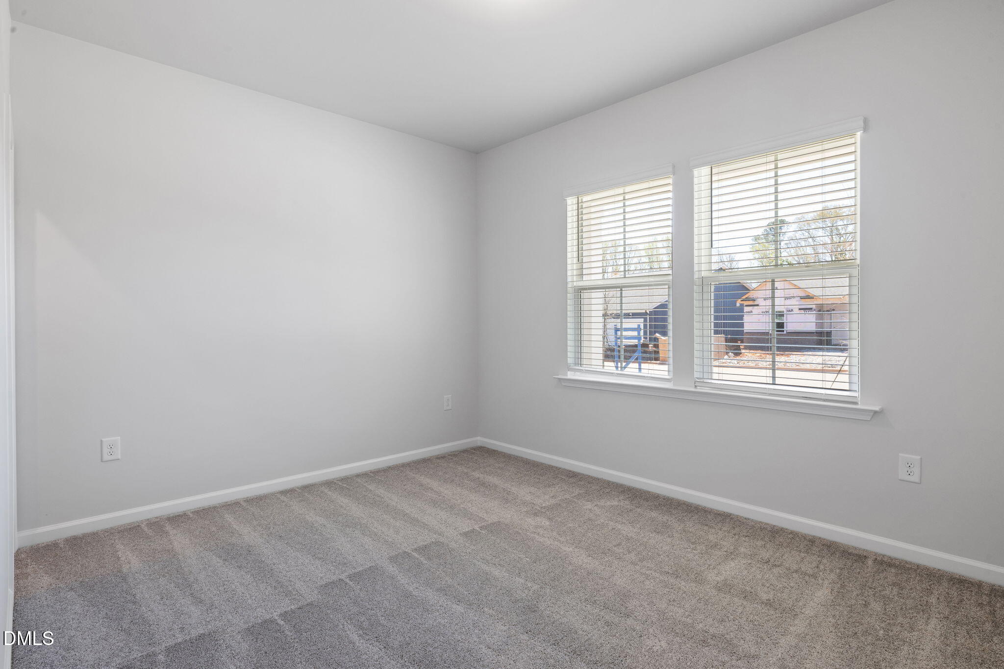 332 Broomside Avenue Raleigh, NC 27603 - Photo 17 of 32 an empty room with a window
