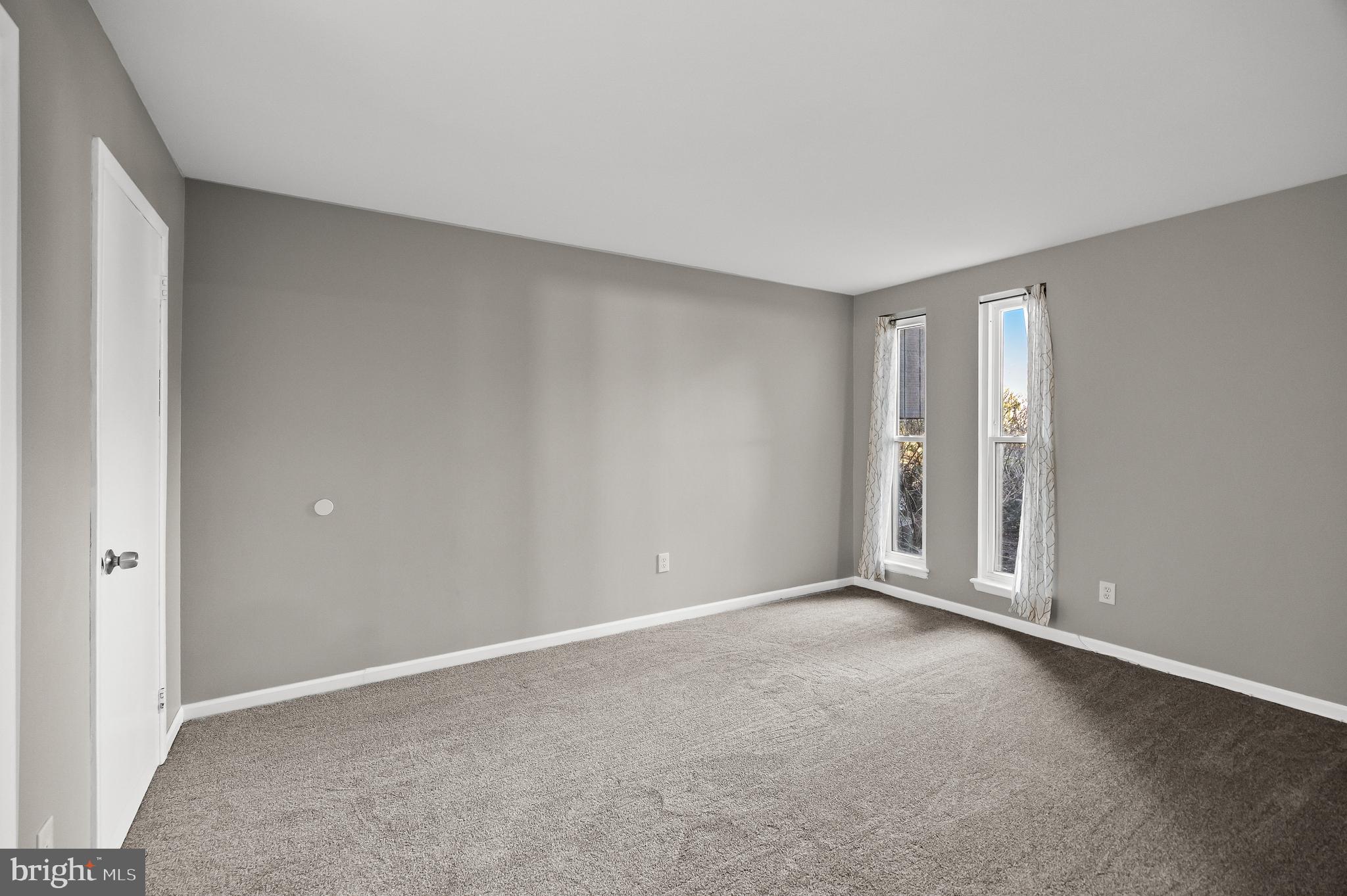 25 South Church Road, Unit 129 Maple Shade, NJ 08052 - Photo 17 of 24 a view of an empty room and window