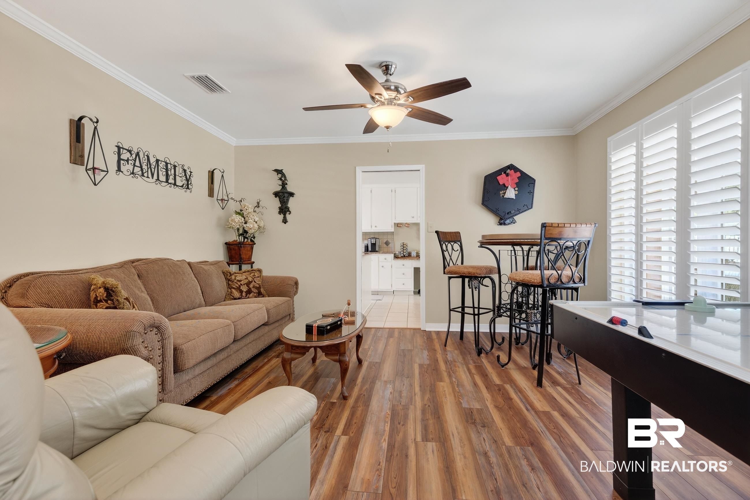 1271 Spring Valley Drive South Mobile, AL 36693 - Photo 12 of 56 Living room featuring ceiling fan, wood finished floors, and ornamental molding