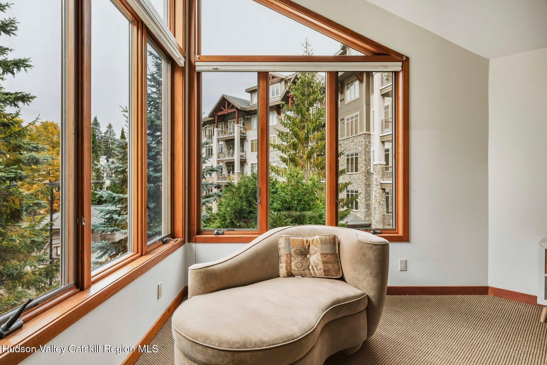 3 The Enclave Windham, NY 12496 - Photo 27 of 59 a living room with furniture and a window