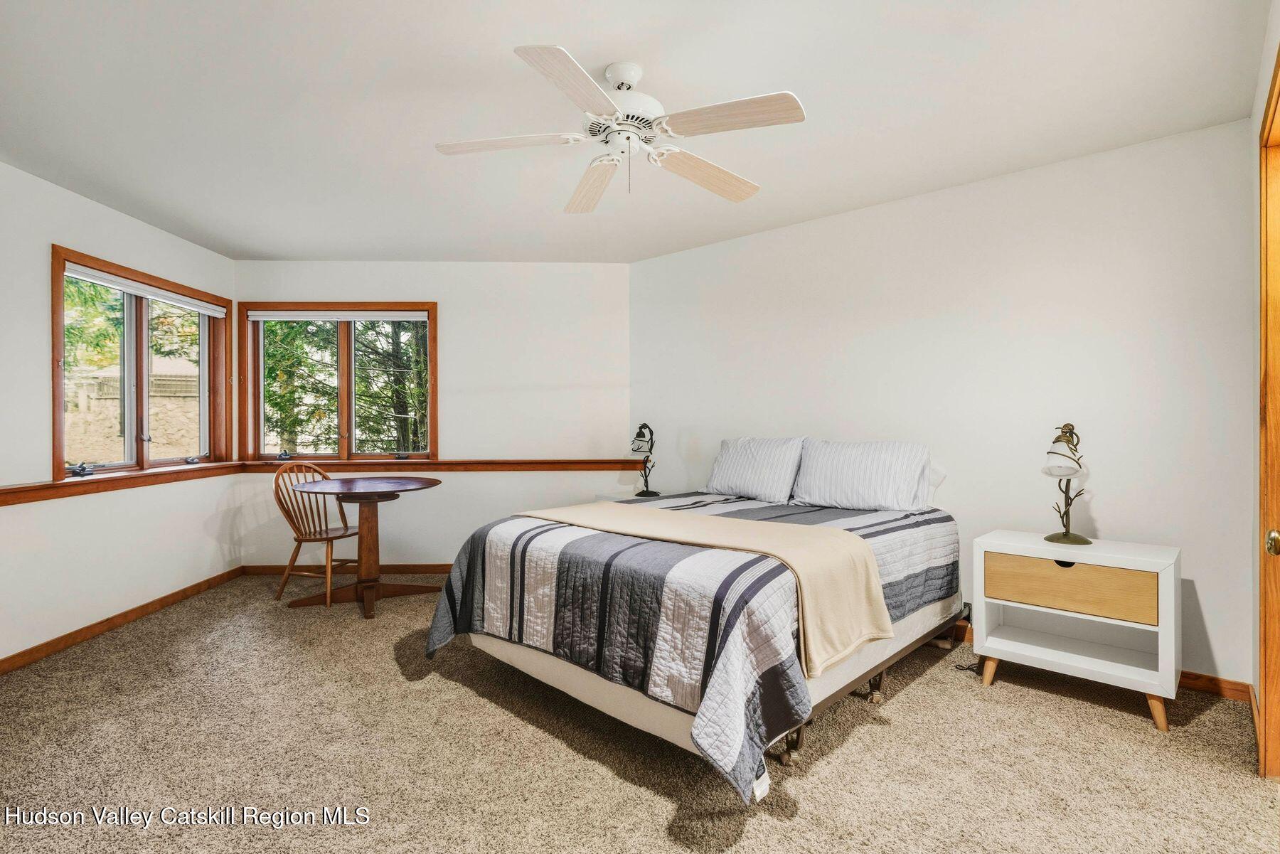 3 The Enclave Windham, NY 12496 - Photo 33 of 59 a bed room with a bed and a window