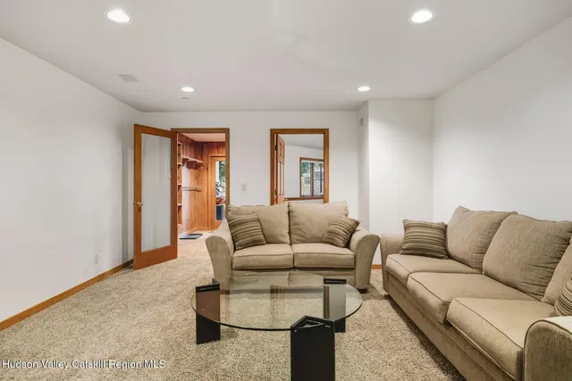 a view of a hallway with a shower