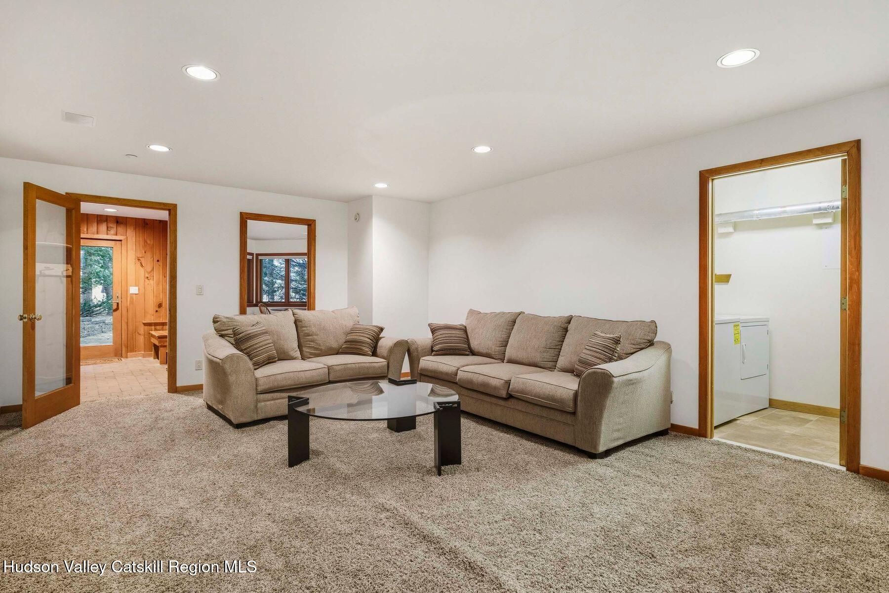 3 The Enclave Windham, NY 12496 - Photo 35 of 59 a living room with furniture and a window