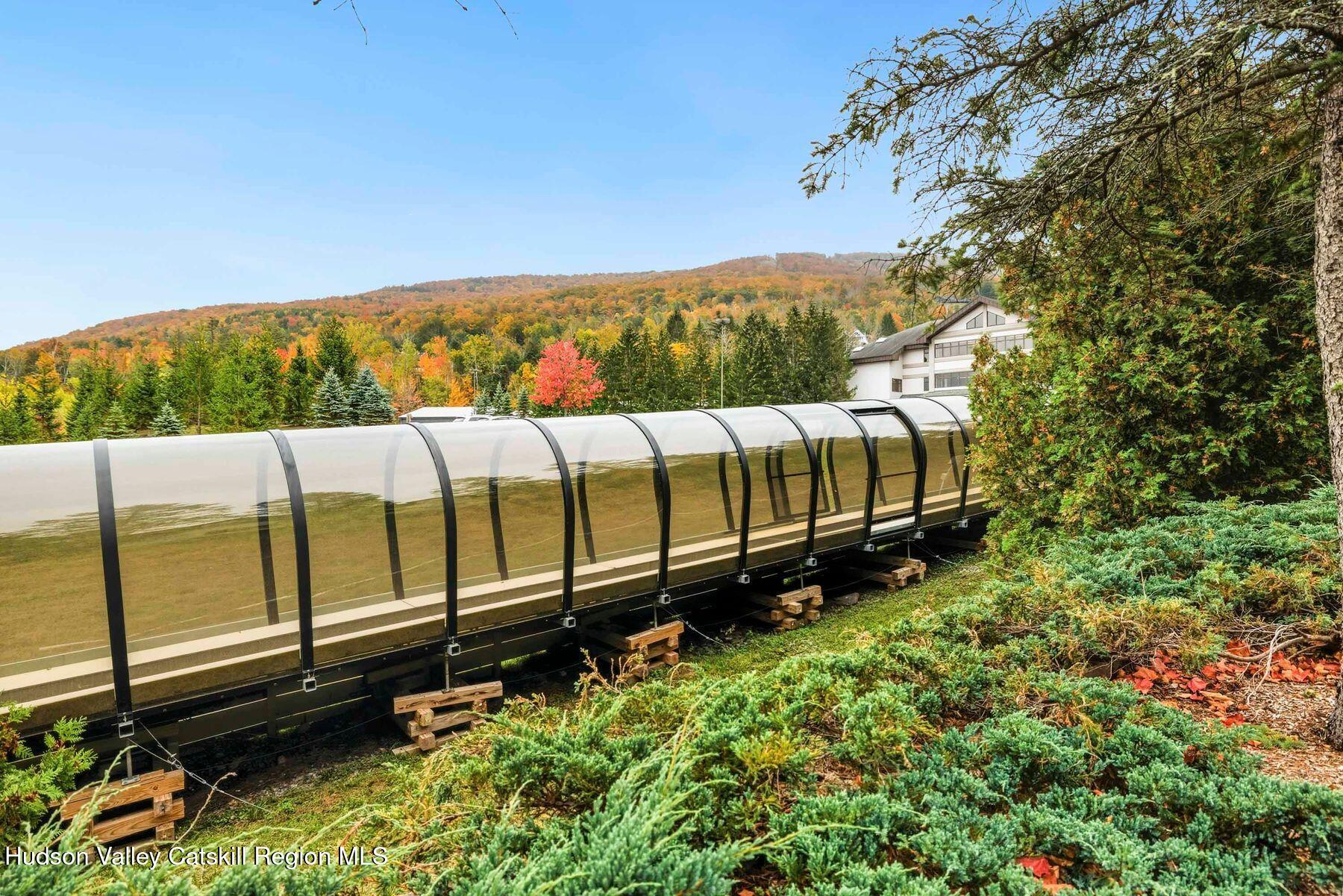 3 The Enclave Windham, NY 12496 - Photo 46 of 59 a view of a green field with wooden fence