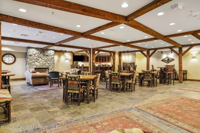 a front view of a house with large windows