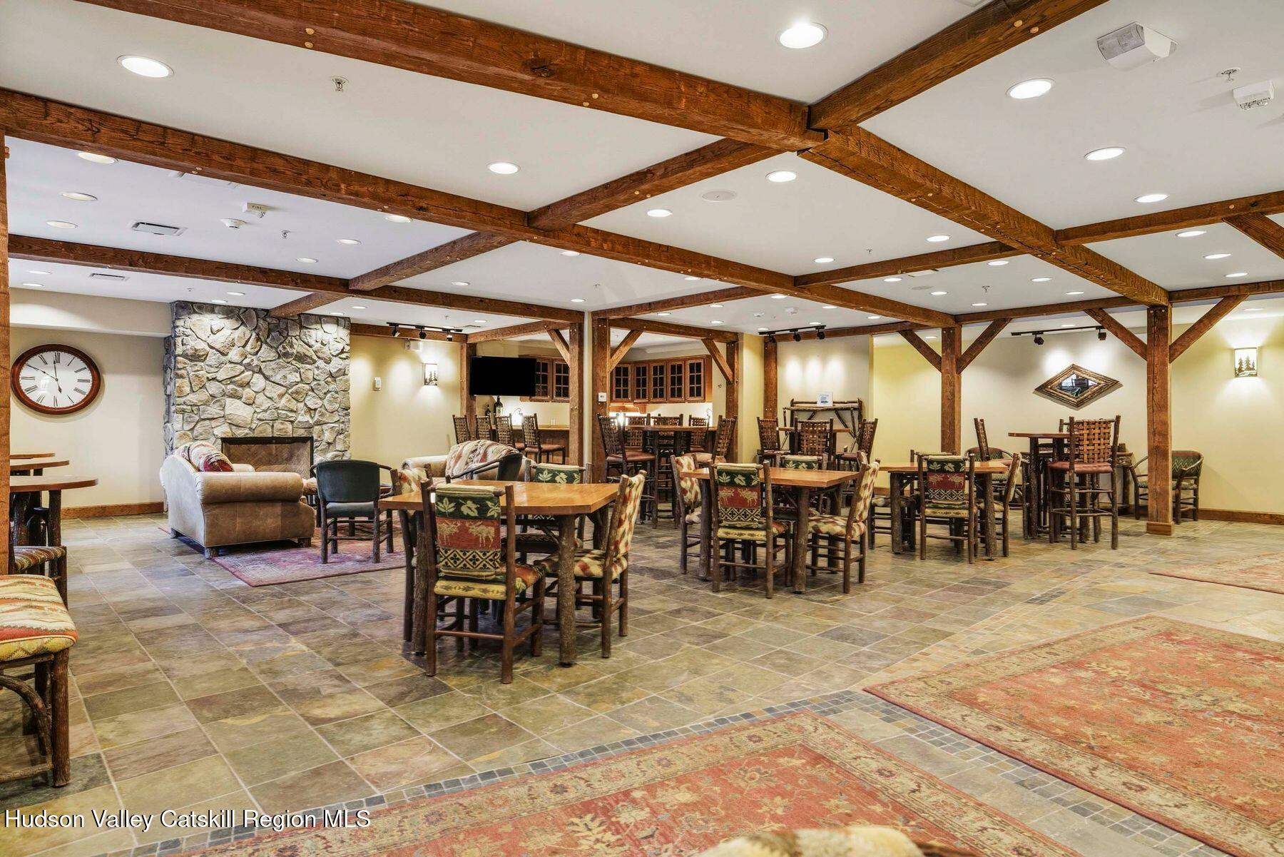 3 The Enclave Windham, NY 12496 - Photo 49 of 59 a view of a big room with dining space a table and chairs