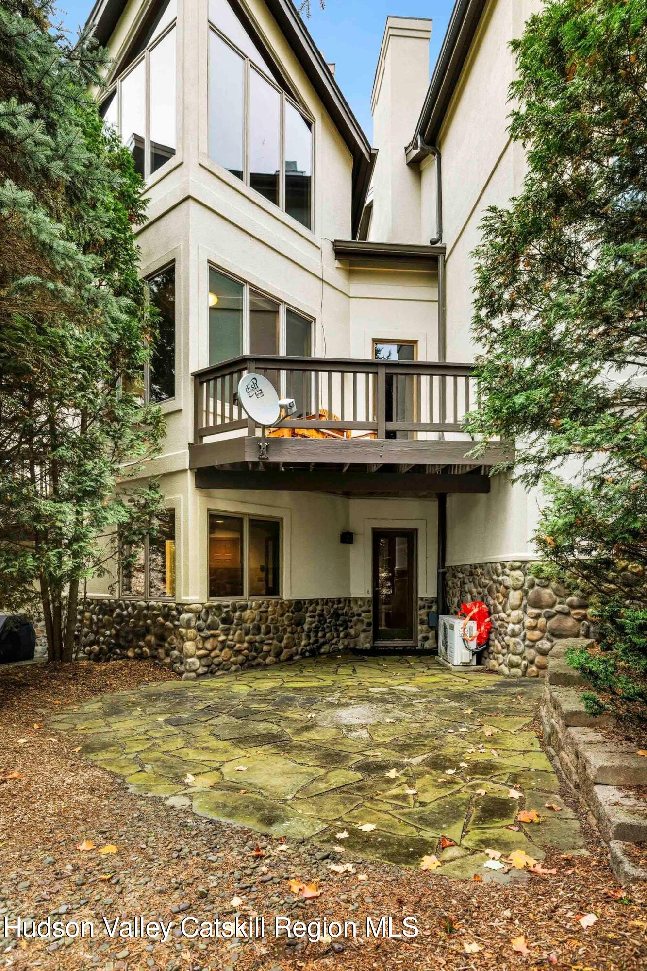 3 The Enclave Windham, NY 12496 - Photo 57 of 59 a front view of a house with large windows