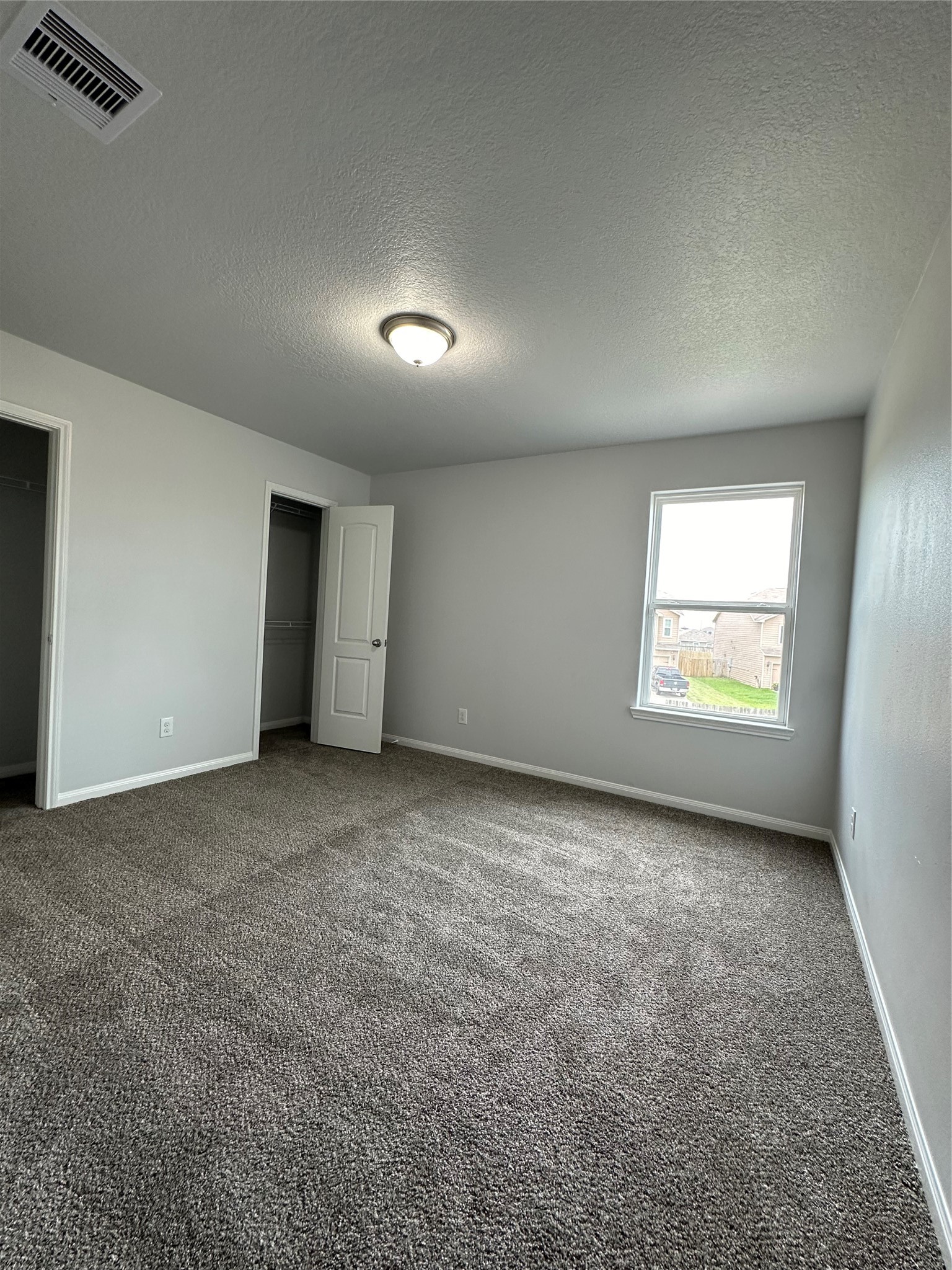 5819 Golden Cove Road Cove, TX 77523 - Photo 11 of 19 an empty room with windows