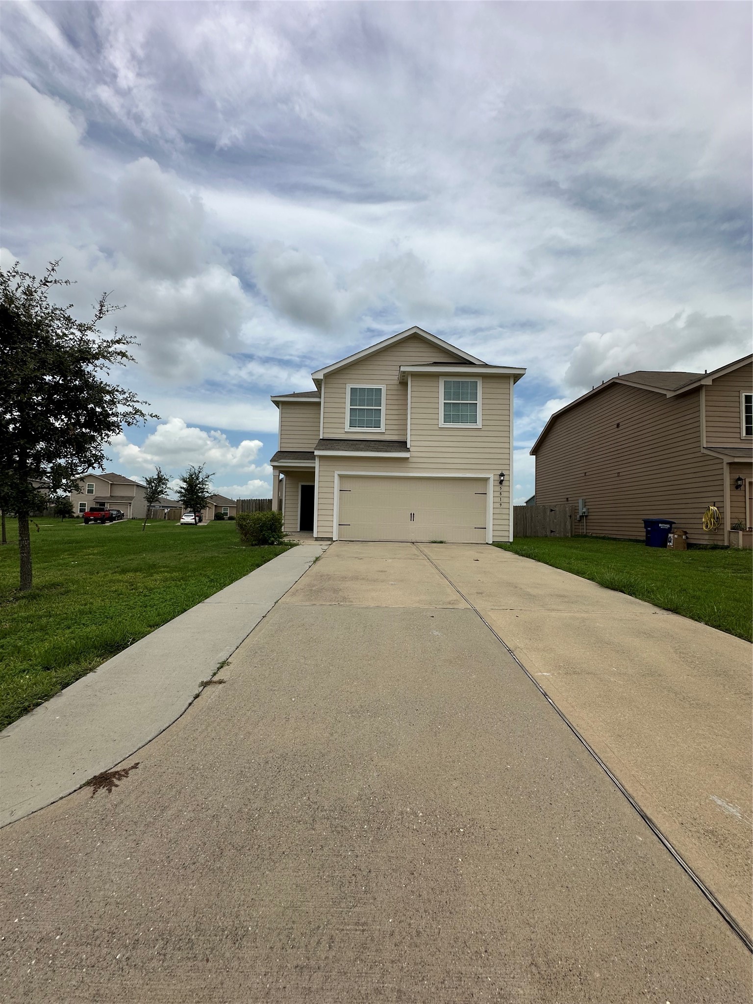 5819 Golden Cove Road Cove, TX 77523 - Photo 2 of 19 a view of a house with a yard