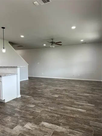 an empty room with a natural light