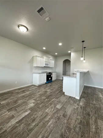 a view of kitchen and sink