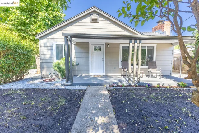 a front view of a house with yard