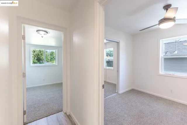 an empty room that has a window