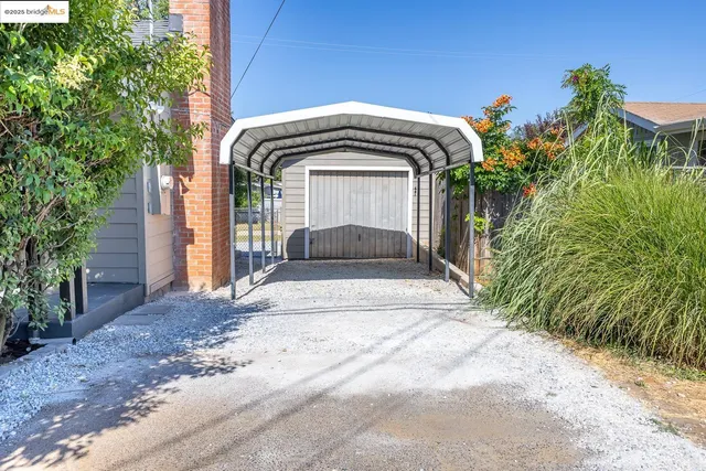 a view of entrance gate of a house