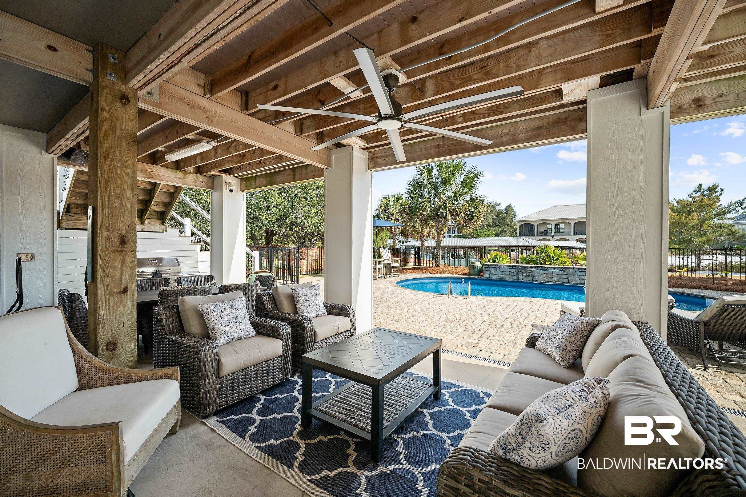 33186 Marlin Key Drive Orange Beach, AL 36561 - Photo 79 of 87 Fenced backyard featuring a patio, outdoor seating, ceiling fan, and a grill