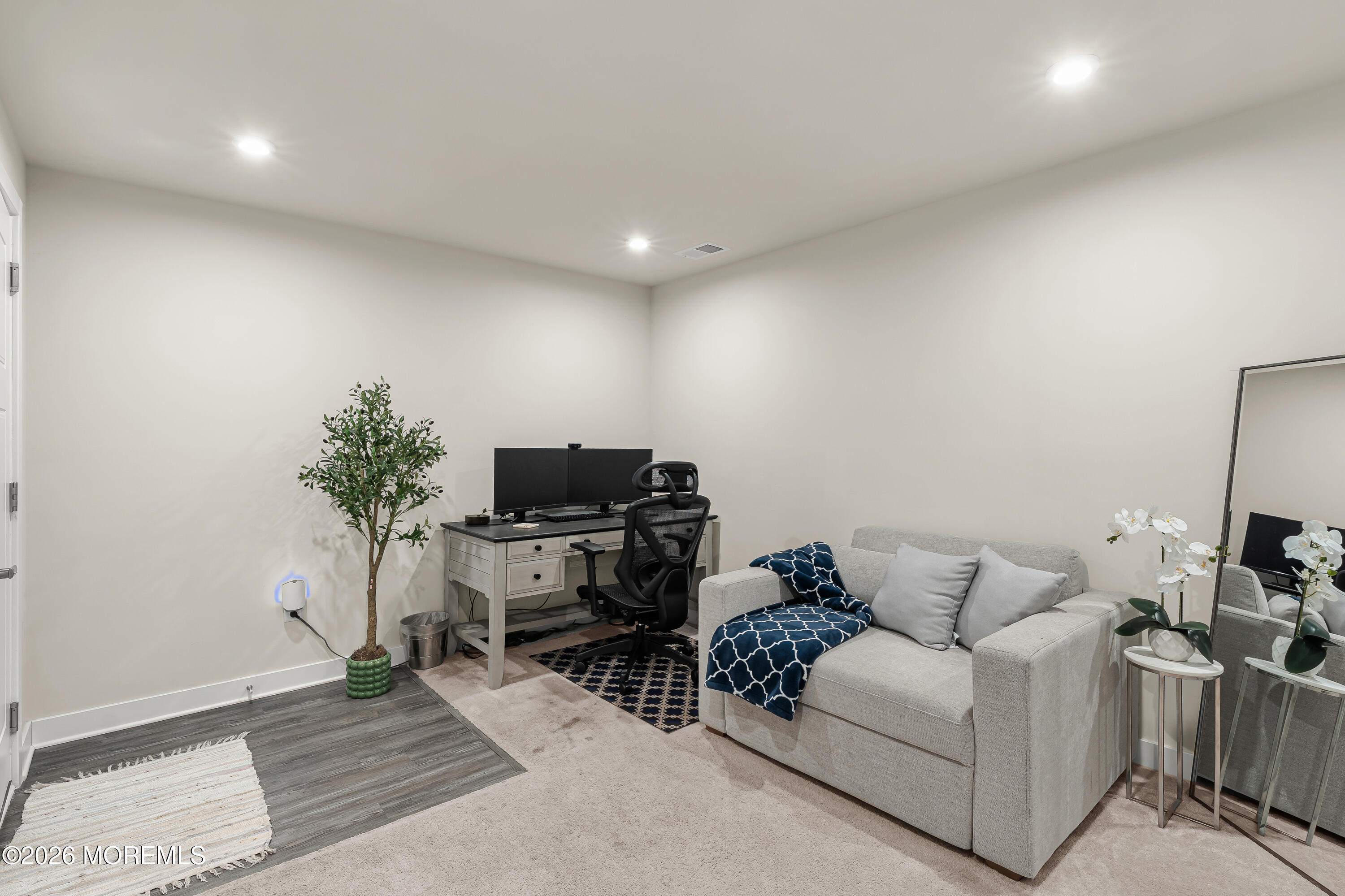 1306 English Lane, Unit 1306 Parlin, NJ 08859 - Photo 25 of 41 a living room with furniture a piano and a flat screen tv