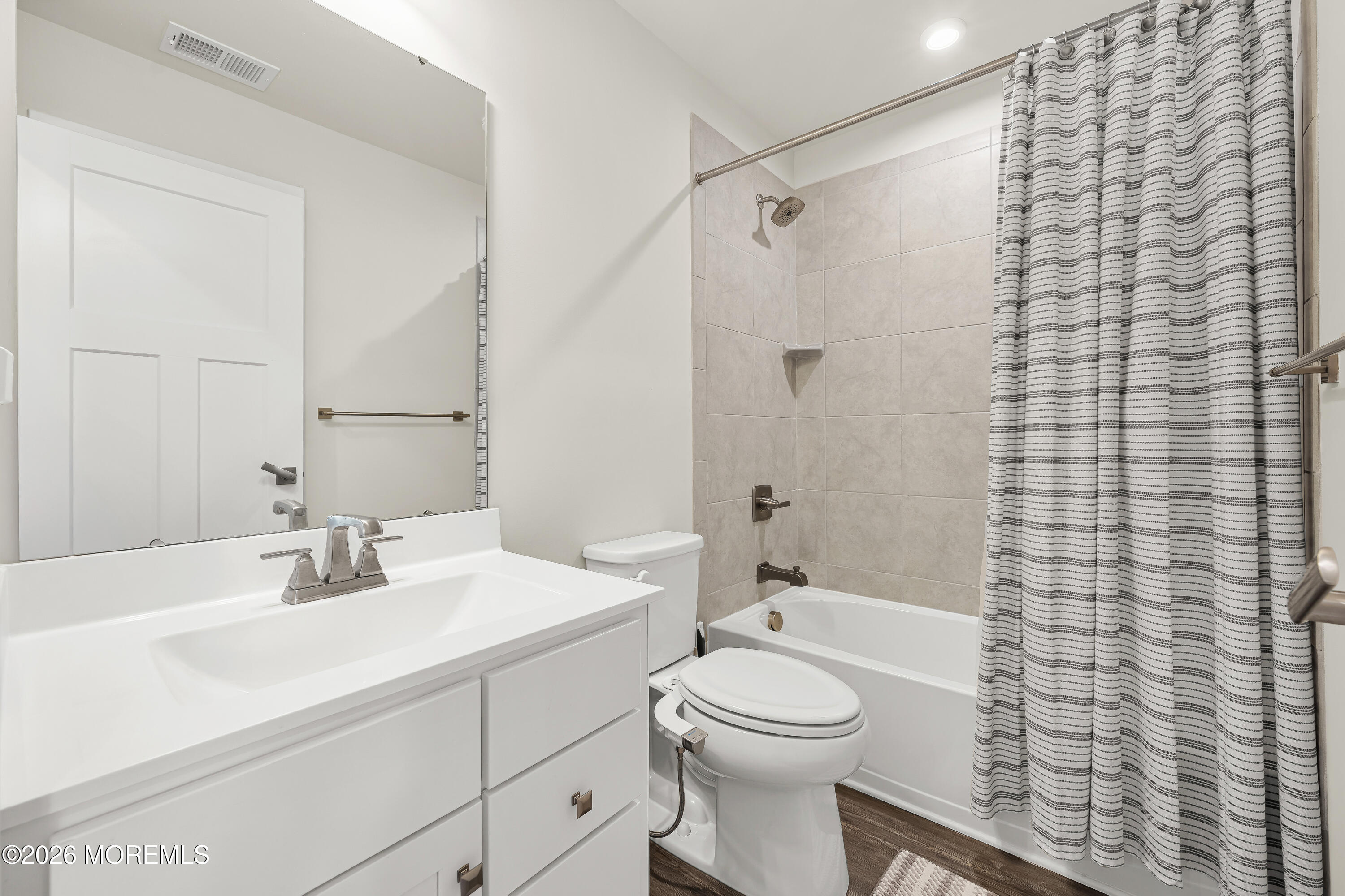 1306 English Lane, Unit 1306 Parlin, NJ 08859 - Photo 30 of 41 a bathroom with a sink a toilet and shower