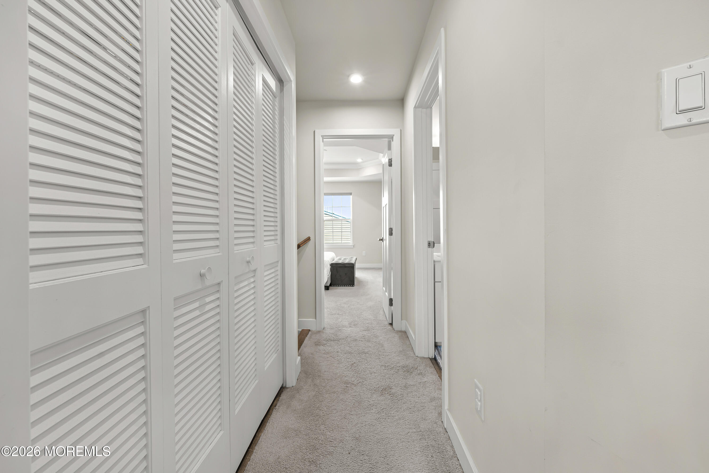 1306 English Lane, Unit 1306 Parlin, NJ 08859 - Photo 7 of 41 a view of a hallway with a wooden door