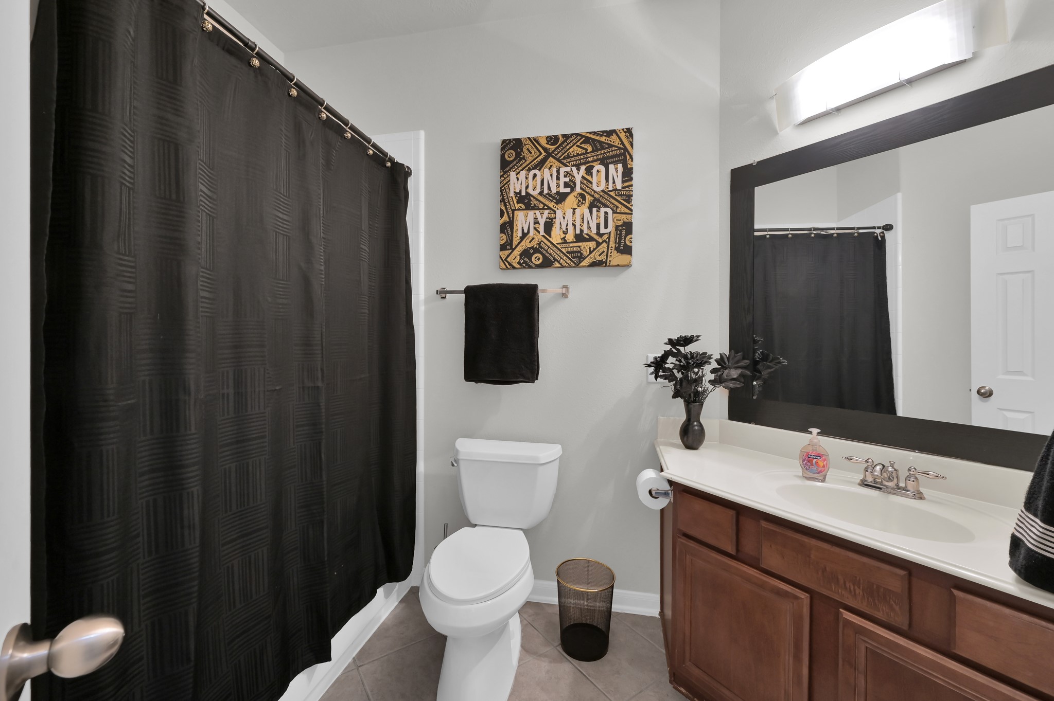 3607 Cedar Flats Lane Spring, TX 77386 - Photo 19 of 47 a bathroom with a toilet sink vanity and mirror