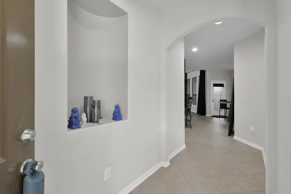 a kitchen with stainless steel appliances granite countertop a refrigerator and a stove