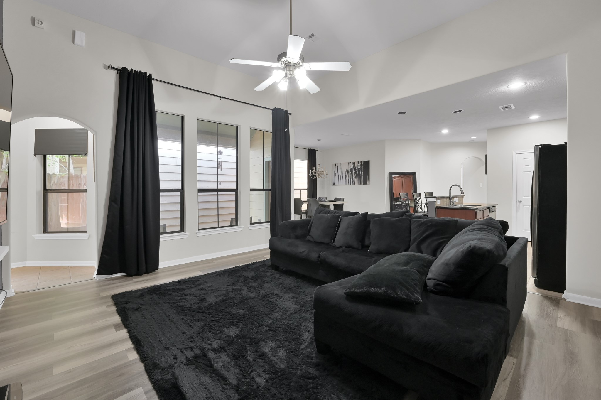 3607 Cedar Flats Lane Spring, TX 77386 - Photo 6 of 47 a living room with furniture and a chandelier