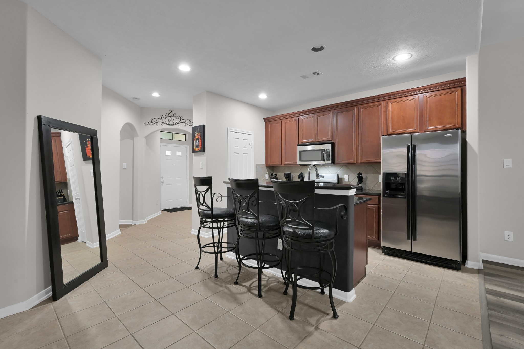 3607 Cedar Flats Lane Spring, TX 77386 - Photo 10 of 47 a kitchen with refrigerator cabinets and furniture