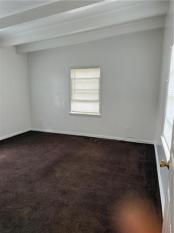 2828 Waters Road Southwest Atlanta, GA 30354 - Photo 6 of 10 an empty room with a window